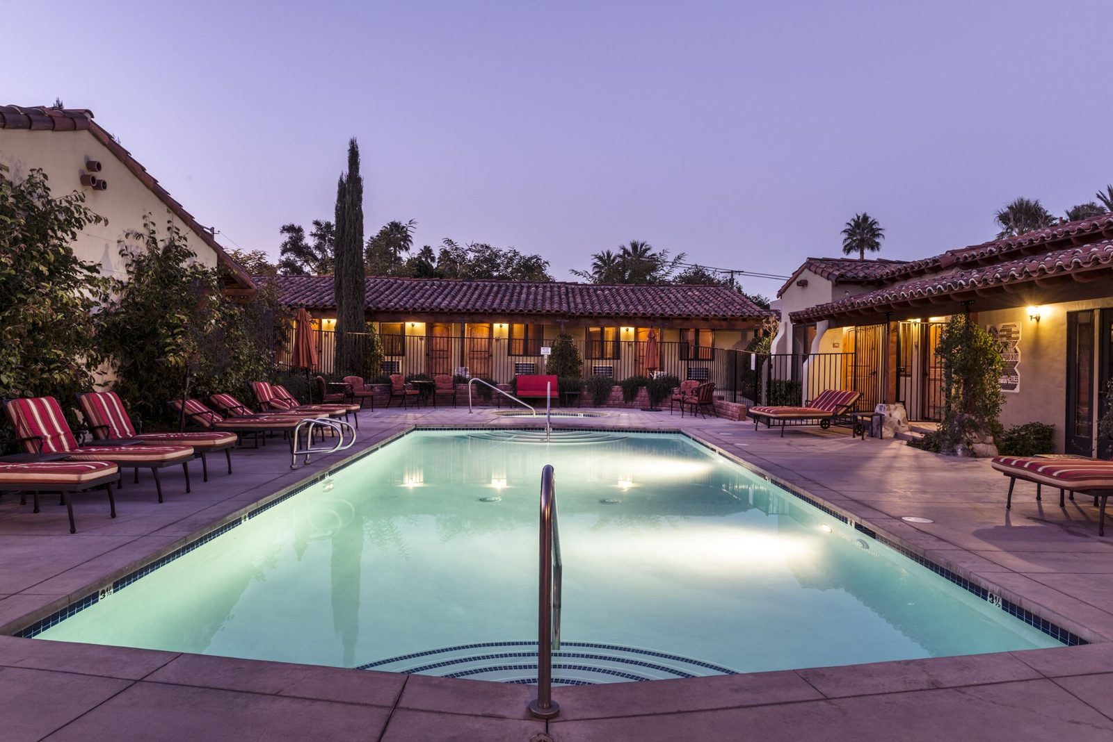 A Palm Springs hotel pool at dusk