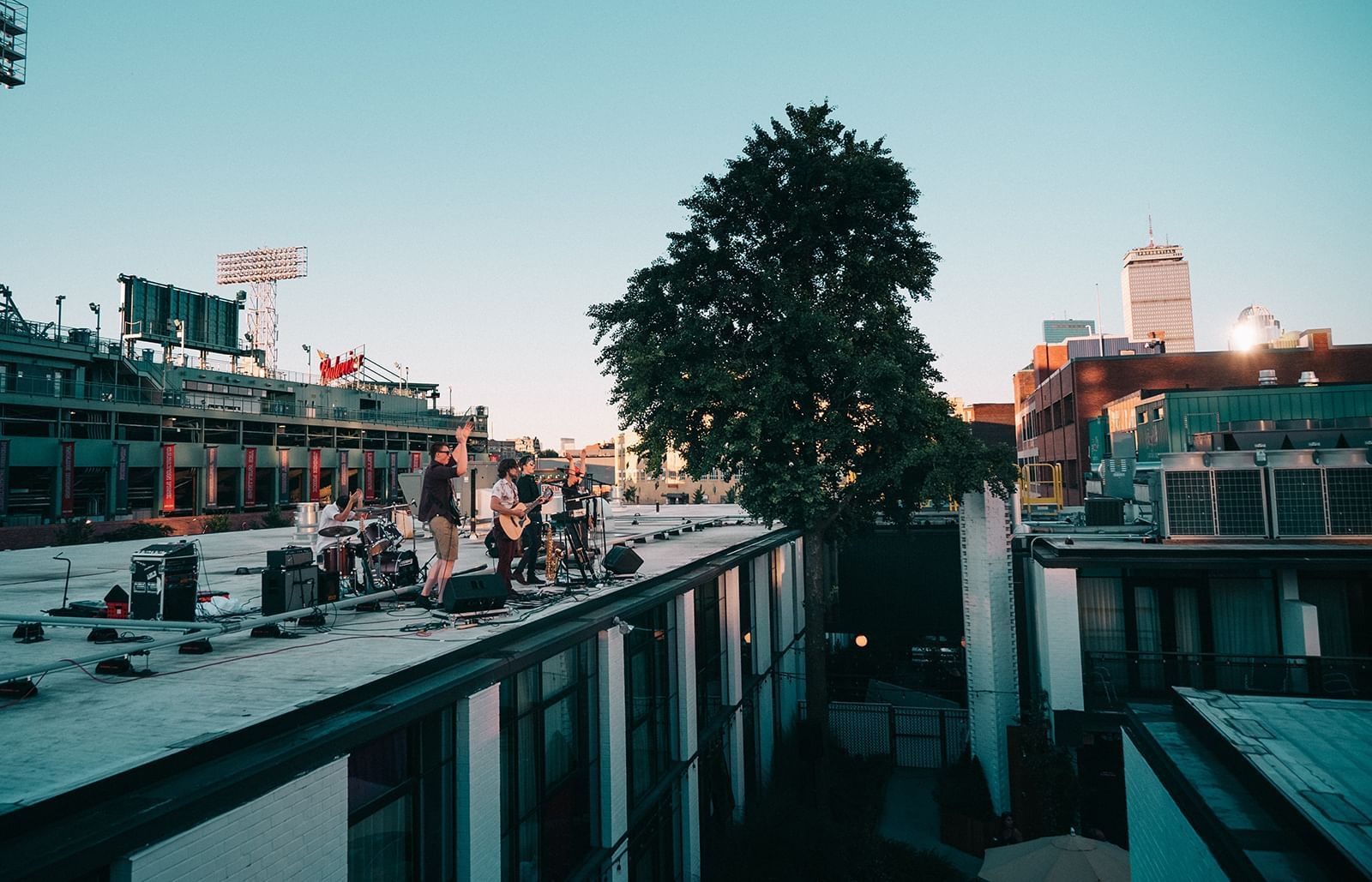 A band playing on The Verb's roof
